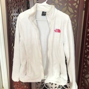 White fuzzy North Face with Breast Cancer ribbon